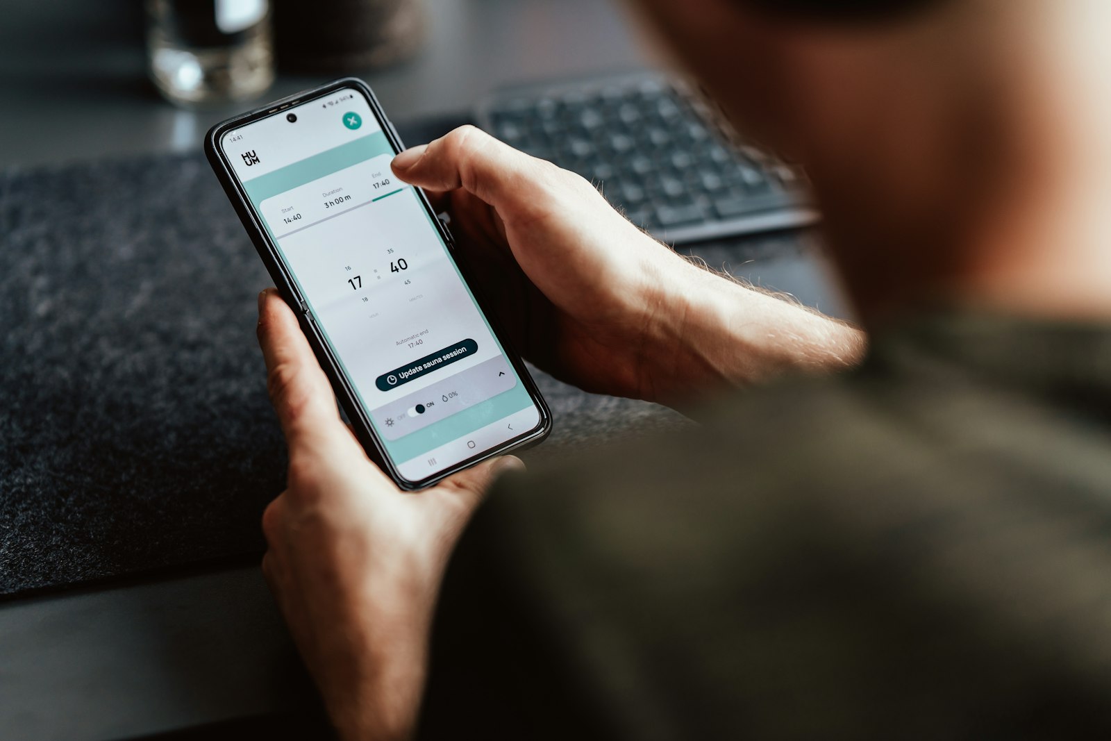 Person tapping through a multi-service app on a smartphone